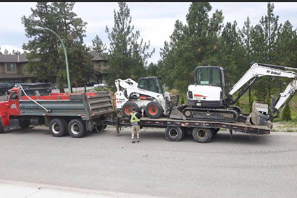 Truck Trailering Excavators