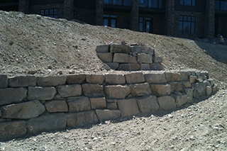 Rock retaining wall