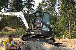 Excavating bobcat